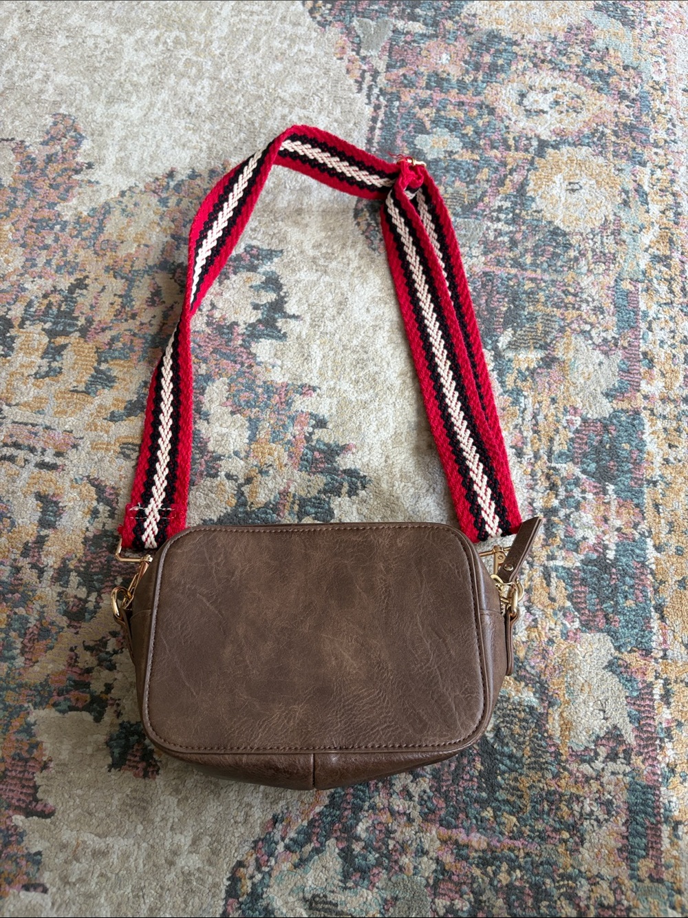 Brown Crossbody Bag with Red Accent Strap